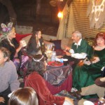 Partygoers at the Flaming Mumak Tavern